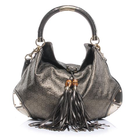 gucci hobo bag with tassels gold hooks|gucci guccissima hobo bag.